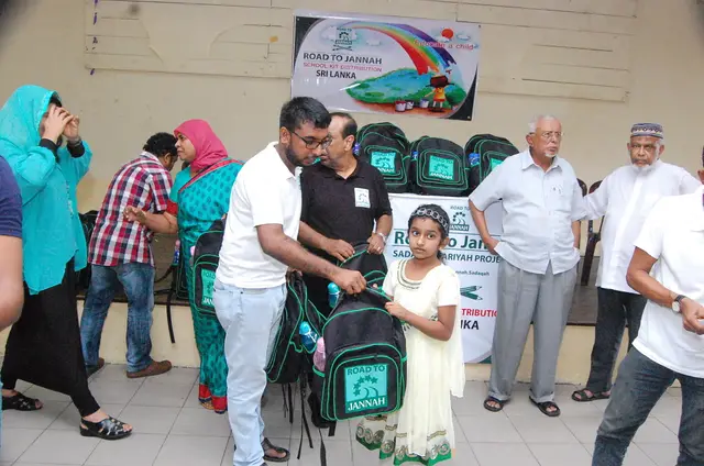 Wheelchairs and school kits, 2016 to 2017. Photo 139 of 148.