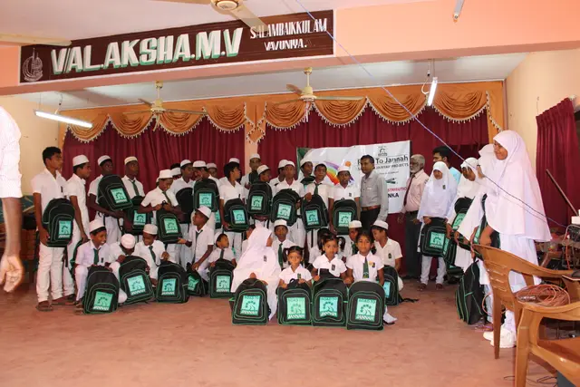 Wheelchairs and school kits, 2016 to 2017. Photo 147 of 148.